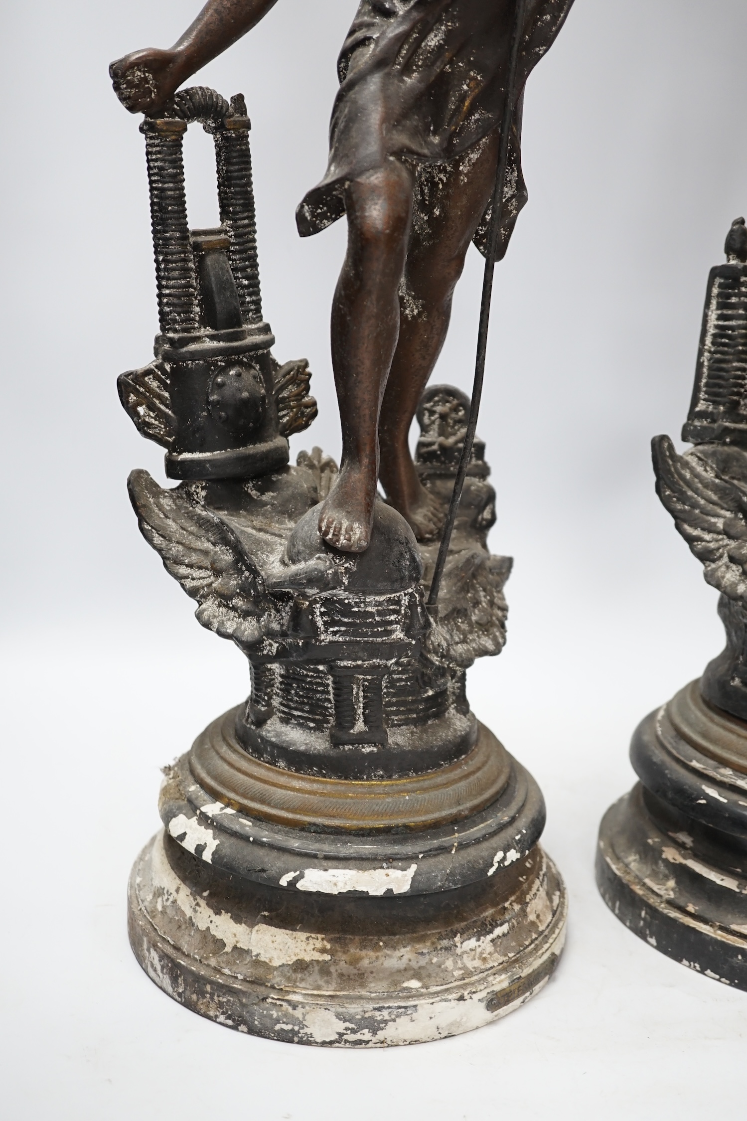 A pair of late 19th century, spelter classical figures on stands, tallest 78cm high